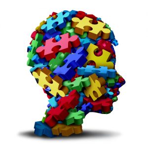 Neurodiversity auf Arbeit - Gehirn aus verschiedenen Puzzleteilen